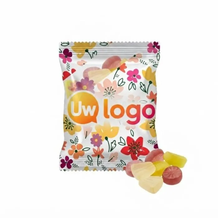 Doorzichtig reclamezakje van 20 g met veganistische exotische fruitgomballen
